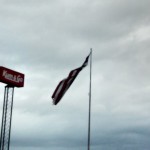 The huge flag flies nearly untethered. 