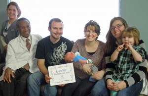 Left to right: Lisa Burmeister, RN; Dr. James Brown, MD; Dillon Karwal; Tymbre Karwal holding Liam; aunt MiKayla Dorscher; and big sister Elizabeth Karwal.