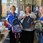 Lewis Elementary School staff with donations